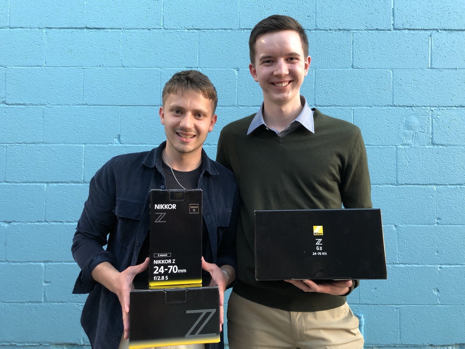 CPOY 76 winners show off their shiny new Nikon gear during the CPOY and POY Awards In Columbia, Missouri. From left, 76th College Photographer of the Year Valdemar Stroe Ren of the Danish School of Media and Journalism and 76th Runner-Up College Photographer of the Year Ethan Swope of Santa Monica College.